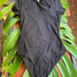 Black Ribbed Bodysuit $15 size S